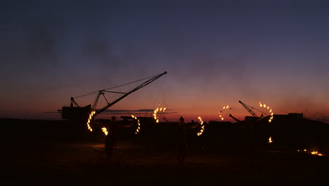 Fire-show.-A-group-of-professional-artists-performs-a-variety-of-fire-facilities.-Boys-and-girls-performed-dances-with-fire-in-the-night-on-the-street-in-the-Park